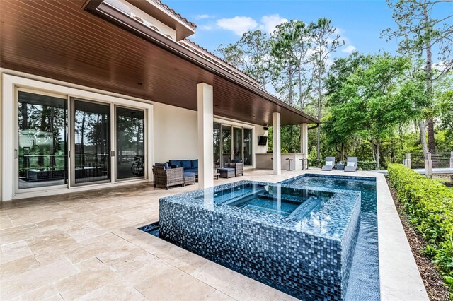10122 Royal Island Ct, Orlando, FL 32836 - view of swimming pool featuring an outdoor living space, a patio, and an in-ground hot tub