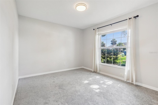 508 Woodview Dr, Tavares, FL 32778 - spare room with carpet and baseboards