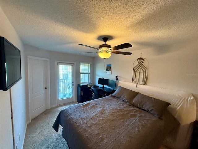 147 Aston Grande Dr, Daytona Beach, FL 32124 - carpeted bedroom with a textured ceiling, a ceiling fan, and access to outside