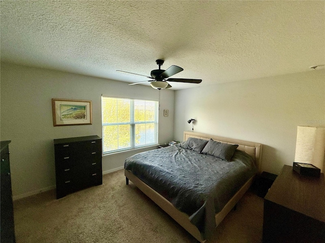 147 Aston Grande Dr, Daytona Beach, FL 32124 - carpeted bedroom with ceiling fan, baseboards, and a textured ceiling