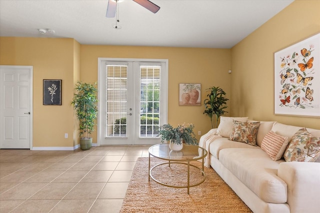 2064 Rafton Rd, Apopka, FL 32703 - living room with french doors, light tile patterned floors, and ceiling fan