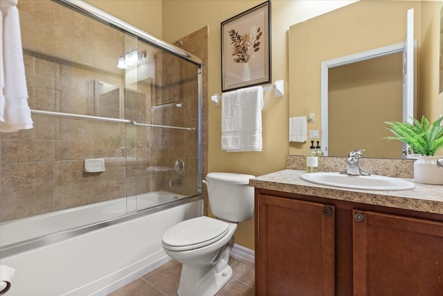 2064 Rafton Rd, Apopka, FL 32703 - full bathroom featuring vanity, bath / shower combo with glass door, and tile patterned flooring