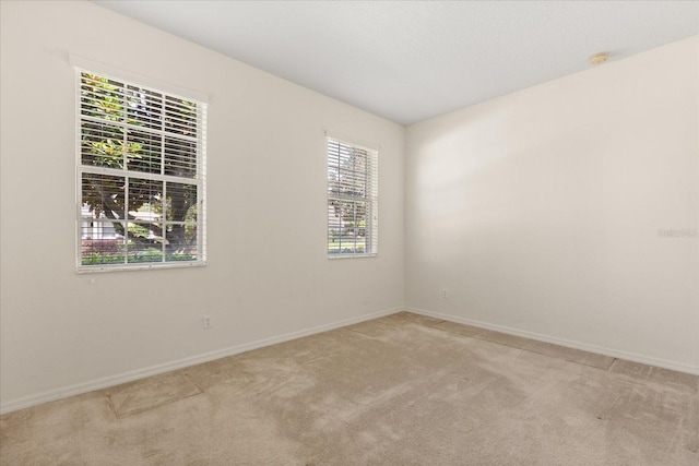2064 Rafton Rd, Apopka, FL 32703 - carpeted spare room with baseboards and a smoke detector