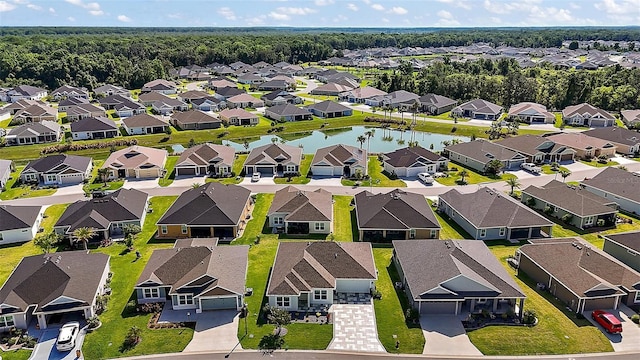 1627 Mclucas Ln, The Villages, FL 34762 - aerial perspective of suburban area with a nearby body of water