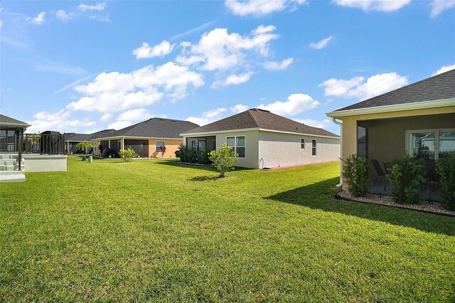 1627 Mclucas Ln, The Villages, FL 34762 - view of green lawn