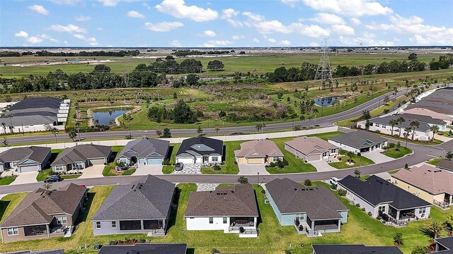 1627 Mclucas Ln, The Villages, FL 34762 - aerial view of residential area featuring a nearby body of water