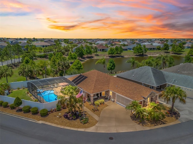 2998 Kramer Ct, The Villages, FL 32163 - aerial view of residential area with a large body of water and a pool
