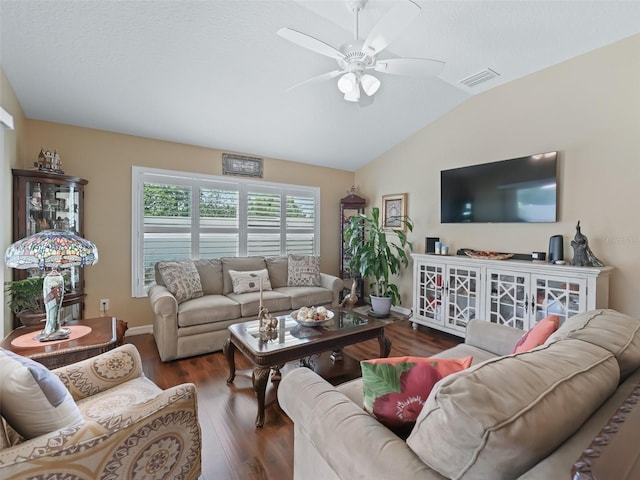 2998 Kramer Ct, The Villages, FL 32163 - living room with lofted ceiling, wood finished floors, ceiling fan, and baseboards