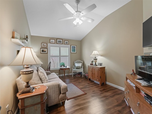2998 Kramer Ct, The Villages, FL 32163 - living room featuring vaulted ceiling, a ceiling fan, dark wood-style flooring, and baseboards