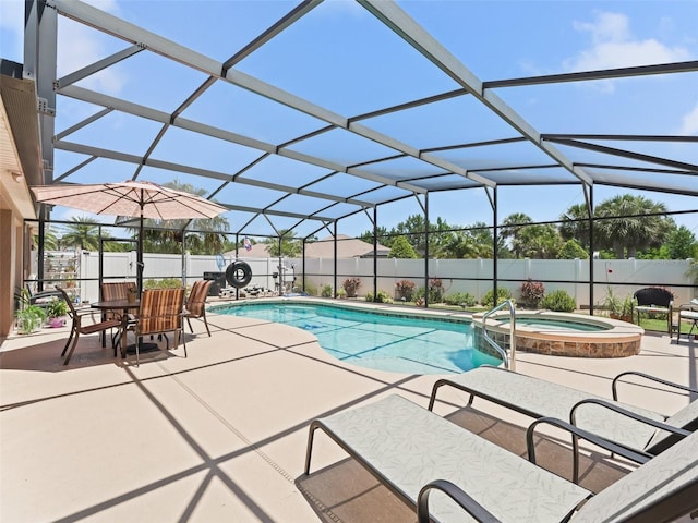2998 Kramer Ct, The Villages, FL 32163 - view of pool with a patio, a fenced backyard, glass enclosure, and a pool with connected hot tub