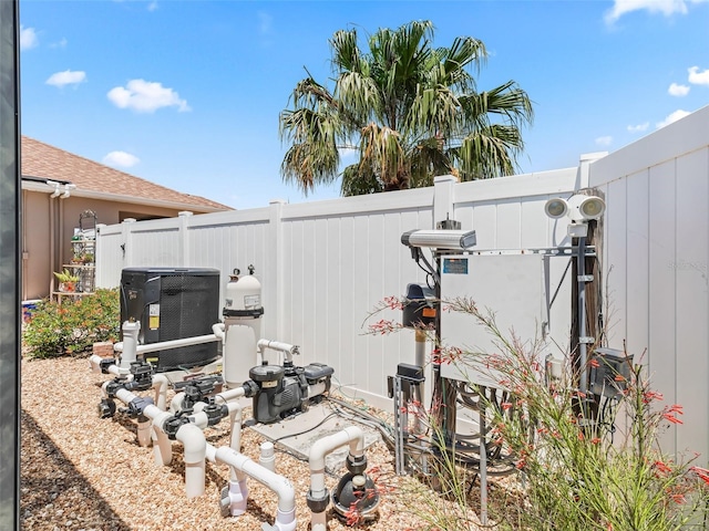2998 Kramer Ct, The Villages, FL 32163 - view of yard with cooling unit and fence