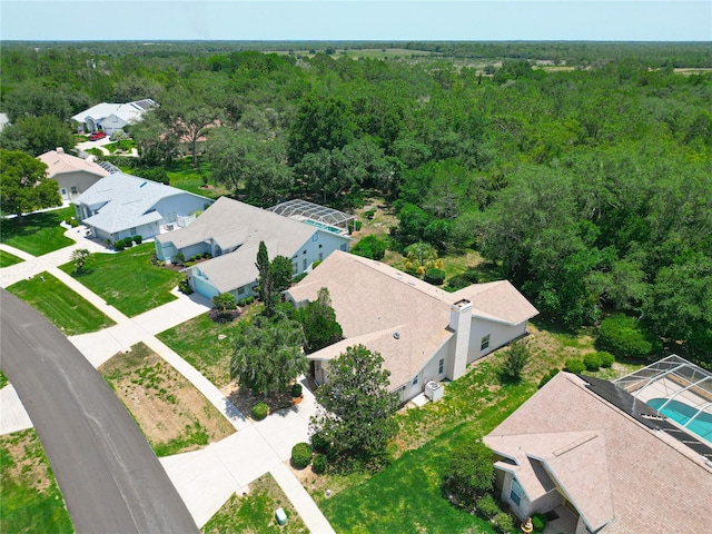 6147 N Whispering Oak Loop, Beverly Hills, FL 34465 - aerial view of residential area featuring a forest