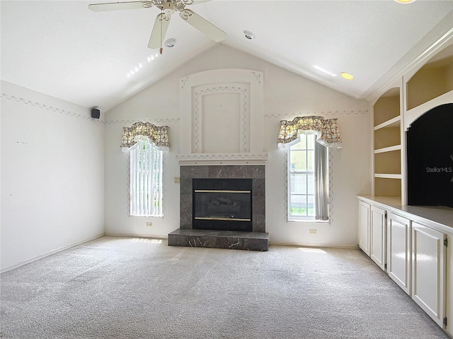 6147 N Whispering Oak Loop, Beverly Hills, FL 34465 - unfurnished living room with plenty of natural light, lofted ceiling, carpet floors, and a ceiling fan