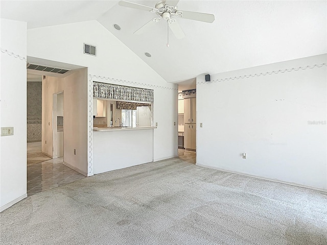 6147 N Whispering Oak Loop, Beverly Hills, FL 34465 - unfurnished living room featuring ceiling fan, light carpet, and high vaulted ceiling