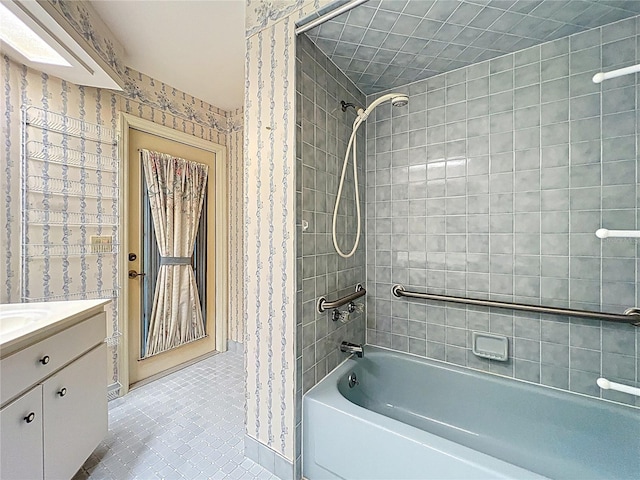 6147 N Whispering Oak Loop, Beverly Hills, FL 34465 - bathroom with wallpapered walls,  shower combination, vanity, and tile patterned floors
