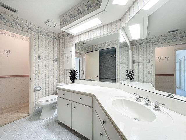 6147 N Whispering Oak Loop, Beverly Hills, FL 34465 - full bathroom with wallpapered walls, toilet, tile patterned flooring, tiled shower, and vanity