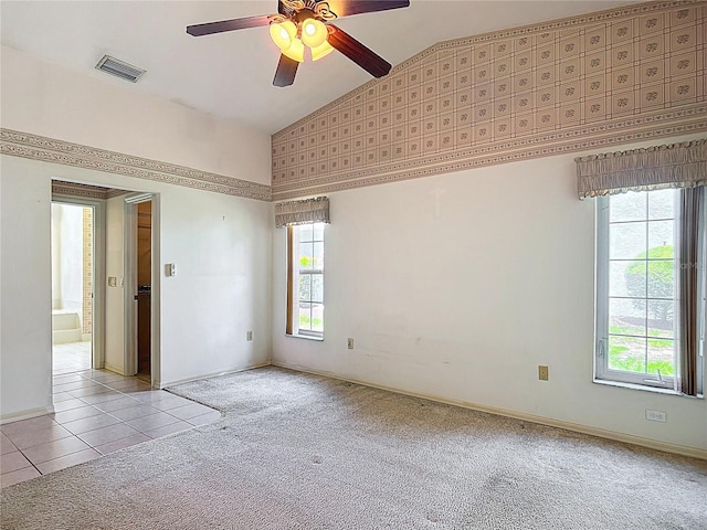 6147 N Whispering Oak Loop, Beverly Hills, FL 34465 - empty room with lofted ceiling, ceiling fan, light colored carpet, baseboards, and light tile patterned floors