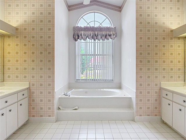 6147 N Whispering Oak Loop, Beverly Hills, FL 34465 - full bathroom with vanity, a bath, vaulted ceiling, baseboards, and ornamental molding