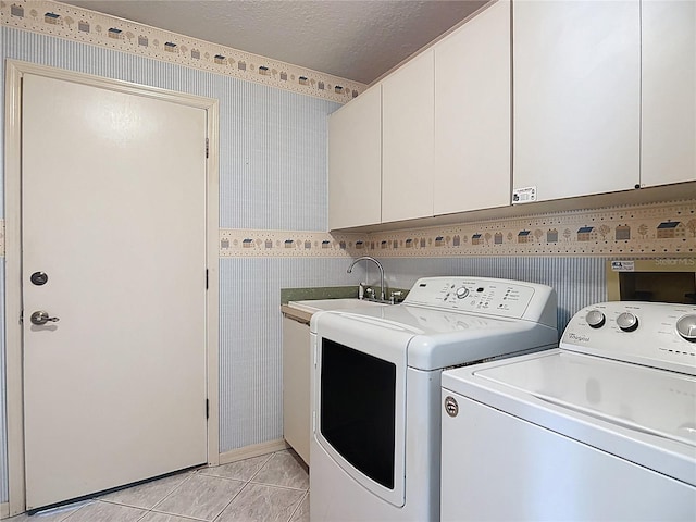 6147 N Whispering Oak Loop, Beverly Hills, FL 34465 - clothes washing area with independent washer and dryer, wallpapered walls, cabinet space, a textured ceiling, and light tile patterned floors