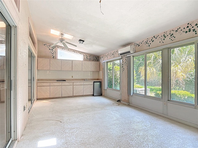 6147 N Whispering Oak Loop, Beverly Hills, FL 34465 - unfurnished sunroom with a wall mounted AC and vaulted ceiling