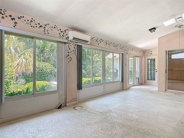 6147 N Whispering Oak Loop, Beverly Hills, FL 34465 - empty room with a wall mounted air conditioner, plenty of natural light, a textured ceiling, and a ceiling fan