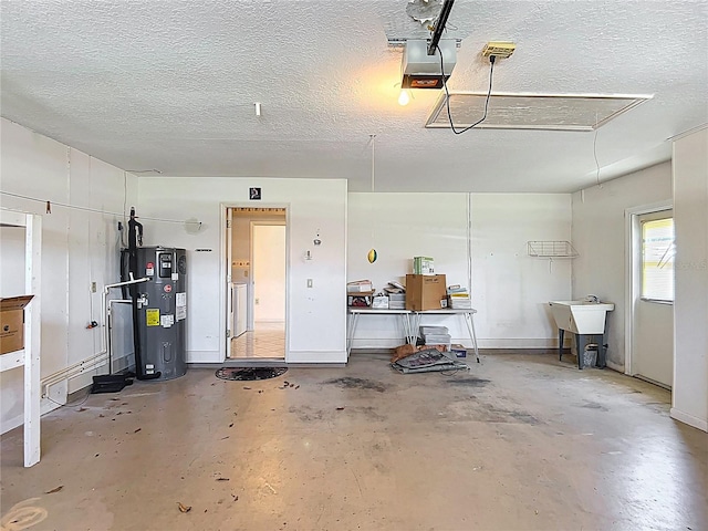 6147 N Whispering Oak Loop, Beverly Hills, FL 34465 - garage featuring hybrid water heater, a garage door opener, and a sink