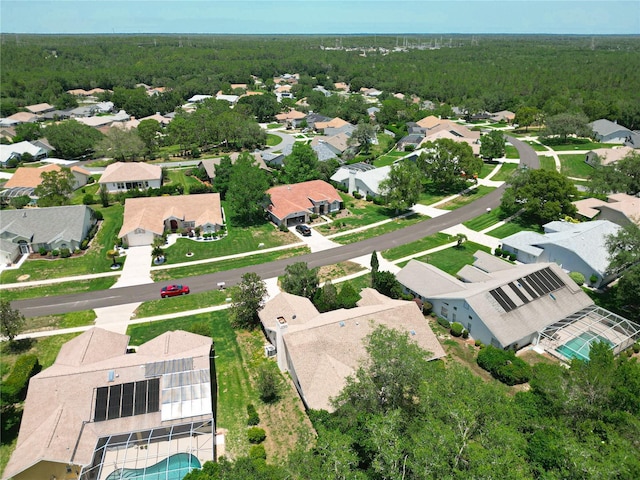 6147 N Whispering Oak Loop, Beverly Hills, FL 34465 - aerial overview of property's location with a heavily wooded area and nearby suburban area