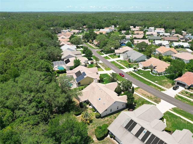 6147 N Whispering Oak Loop, Beverly Hills, FL 34465 - aerial perspective of suburban area featuring a heavily wooded area