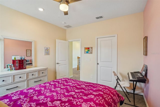 carpeted bedroom with baseboards and a ceiling fan