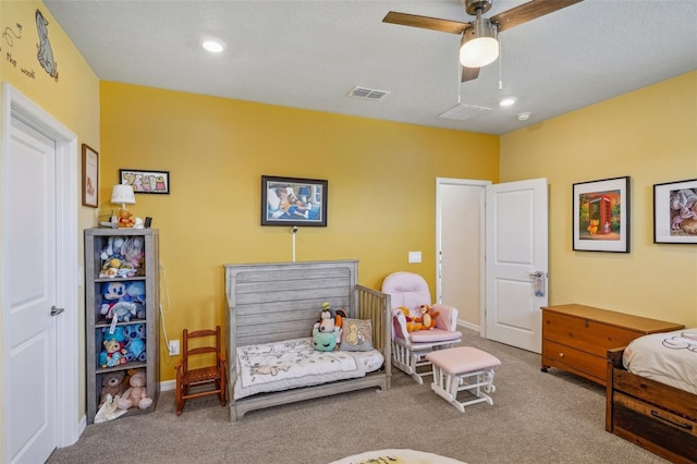 carpeted bedroom with a ceiling fan, baseboards, and recessed lighting