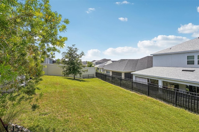 view of yard featuring a residential view