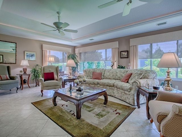 3112 Burbank Ln, The Villages, FL 32162 - living area featuring ceiling fan, a raised ceiling, and light tile patterned flooring