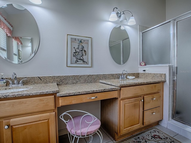 3112 Burbank Ln, The Villages, FL 32162 - full bath with a shower stall, vanity, and tile patterned floors