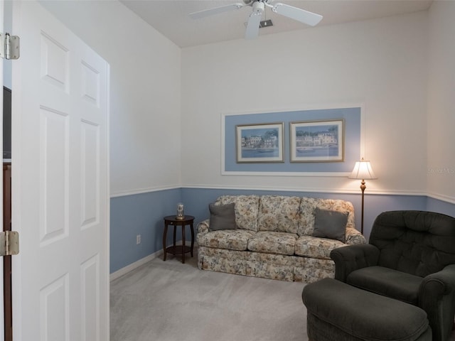 25243 River Crest Dr, Leesburg, FL 34748 - living area featuring carpet, a ceiling fan, and baseboards