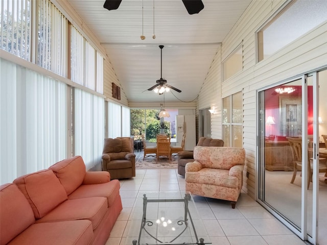 25243 River Crest Dr, Leesburg, FL 34748 - sunroom with tile patterned flooring and high vaulted ceiling