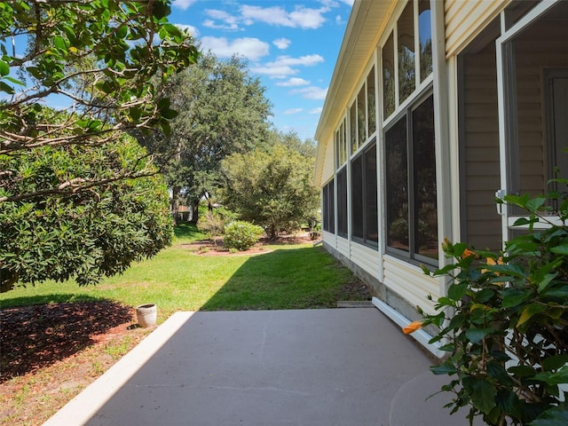 25243 River Crest Dr, Leesburg, FL 34748 - view of green lawn with a patio area