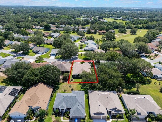 25243 River Crest Dr, Leesburg, FL 34748 - aerial perspective of suburban area featuring property parcel outlined