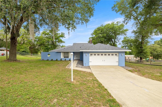 8180 N Duval Dr, Citrus Springs, FL 34434 - single story home featuring a garage, concrete driveway, and stucco siding