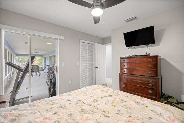 8180 N Duval Dr, Citrus Springs, FL 34434 - carpeted bedroom with ceiling fan, access to outside, and a closet