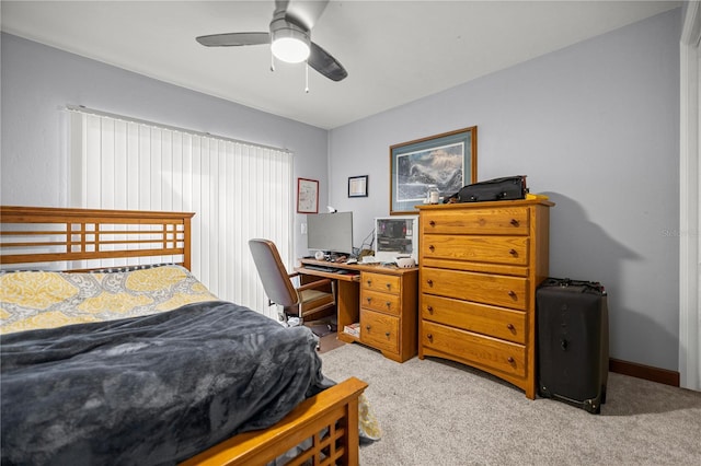 8180 N Duval Dr, Citrus Springs, FL 34434 - bedroom featuring light carpet and a ceiling fan