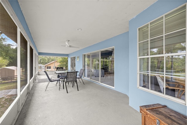 8180 N Duval Dr, Citrus Springs, FL 34434 - sunroom / solarium featuring outdoor dining area and a ceiling fan