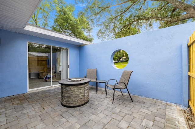 8180 N Duval Dr, Citrus Springs, FL 34434 - view of patio / terrace with a fire pit