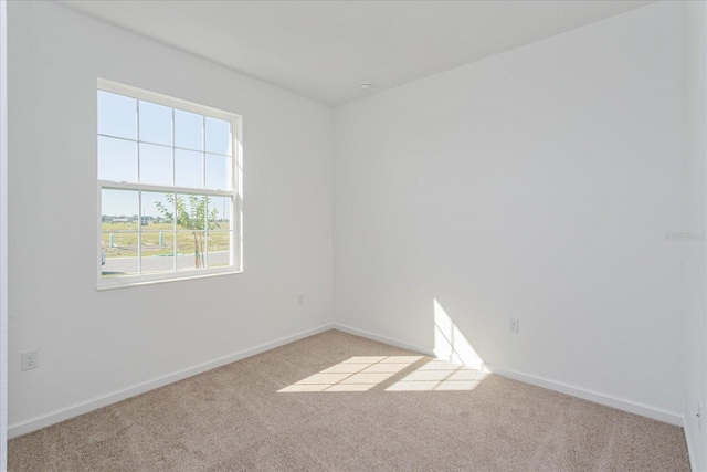 5017 Balsam Falls Rd, Deland, FL 32724 - carpeted spare room with baseboards