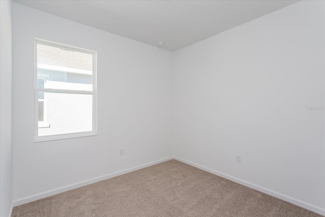 5017 Balsam Falls Rd, Deland, FL 32724 - unfurnished room with carpet and baseboards