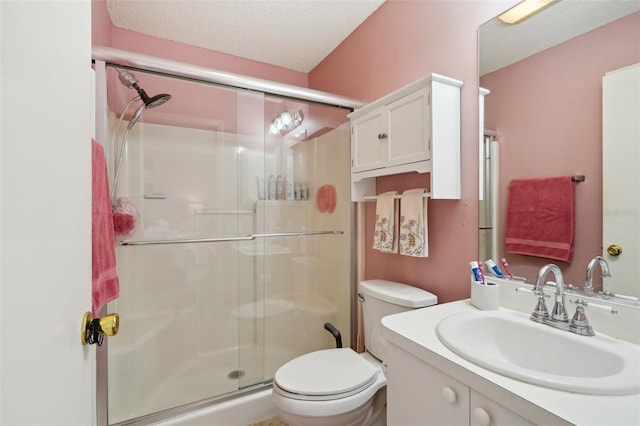 1728 Morelos Rd, The Villages, FL 32159 - full bath with a stall shower, a textured ceiling, toilet, and vanity