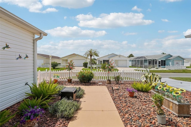 1728 Morelos Rd, The Villages, FL 32159 - view of patio with a residential view and a garage