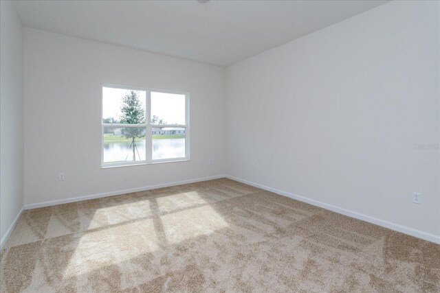 5025 Balsam Falls Rd, Deland, FL 32724 - carpeted spare room featuring baseboards