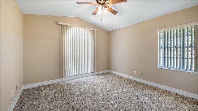 15245 Arabian Way, Montverde, FL 34756 - spare room featuring a ceiling fan, carpet floors, lofted ceiling, and baseboards