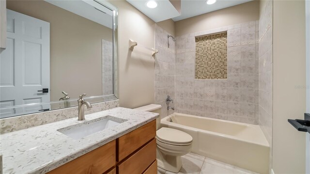 15245 Arabian Way, Montverde, FL 34756 - bathroom with toilet, bathtub / shower combination, tile patterned flooring, vanity, and recessed lighting