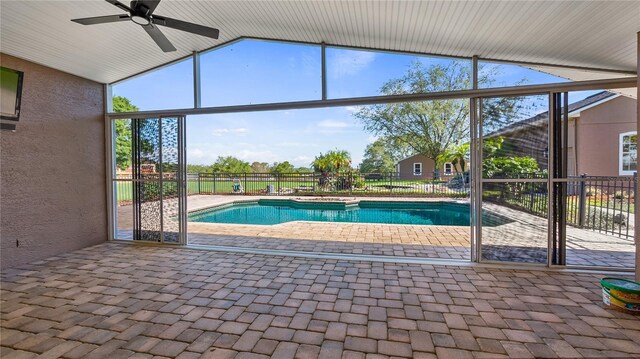 15245 Arabian Way, Montverde, FL 34756 - view of swimming pool with ceiling fan, a patio area, and fence